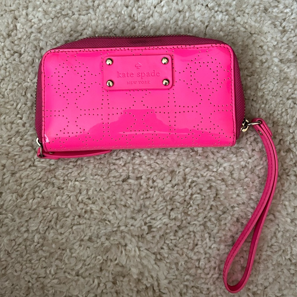 The Kate Spade Metro Spade Jazzy Zip-around Wristlet
Wallet.